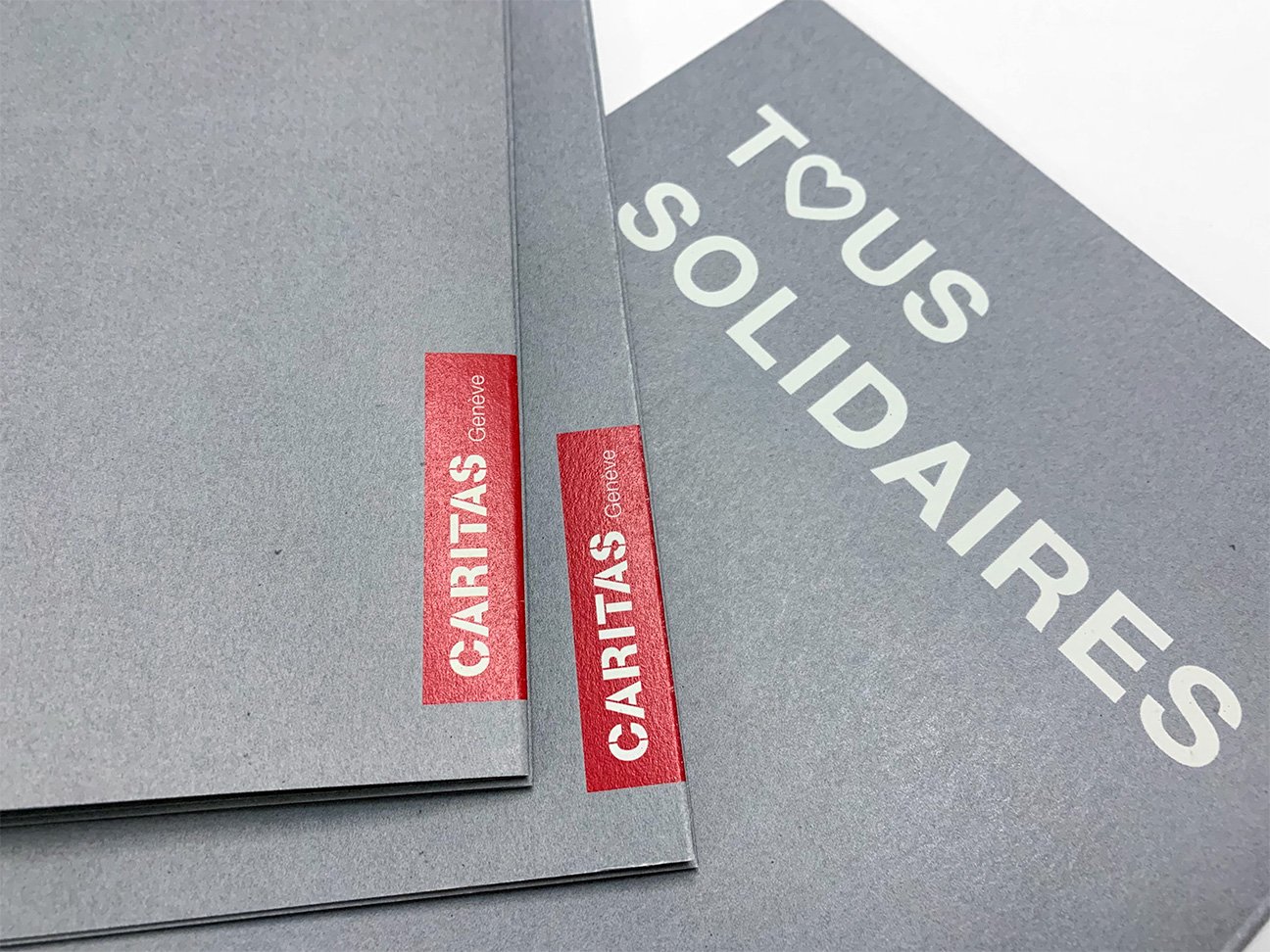 fabien_cuffel_graphisme_typographie_Brochure_Caritas_Geneve_ok